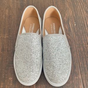 Woman’s size 7.5 Silver Sparkly Slip Ons